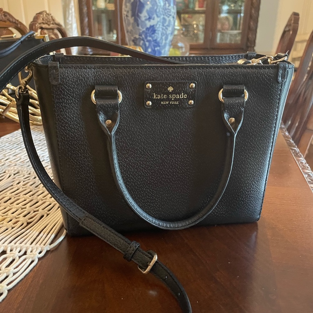 SOLD SOLD.   Kate Spade Black Leather satchel purse. Shoulder strap top handle